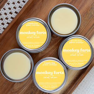 Monkey Farts Solid Lotion in a tin