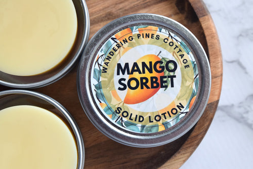 mango sorbet solid lotion in a tin - wandering pines cottage